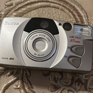 Canon Sure Shot Silver Film Camera with Ergonomic Design
